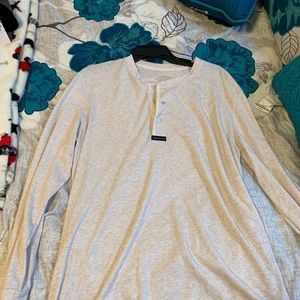 “The boyfriend tee” tan colored t shirt